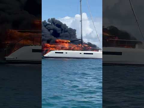 Part 2. Watch the mast fall. #sailing #boating #yachtlife #boatlife # boatfire #catamaran